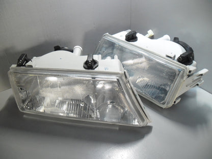 82457952 / 82457953 Lancia Dedra koplamp set met hoogte verstelling