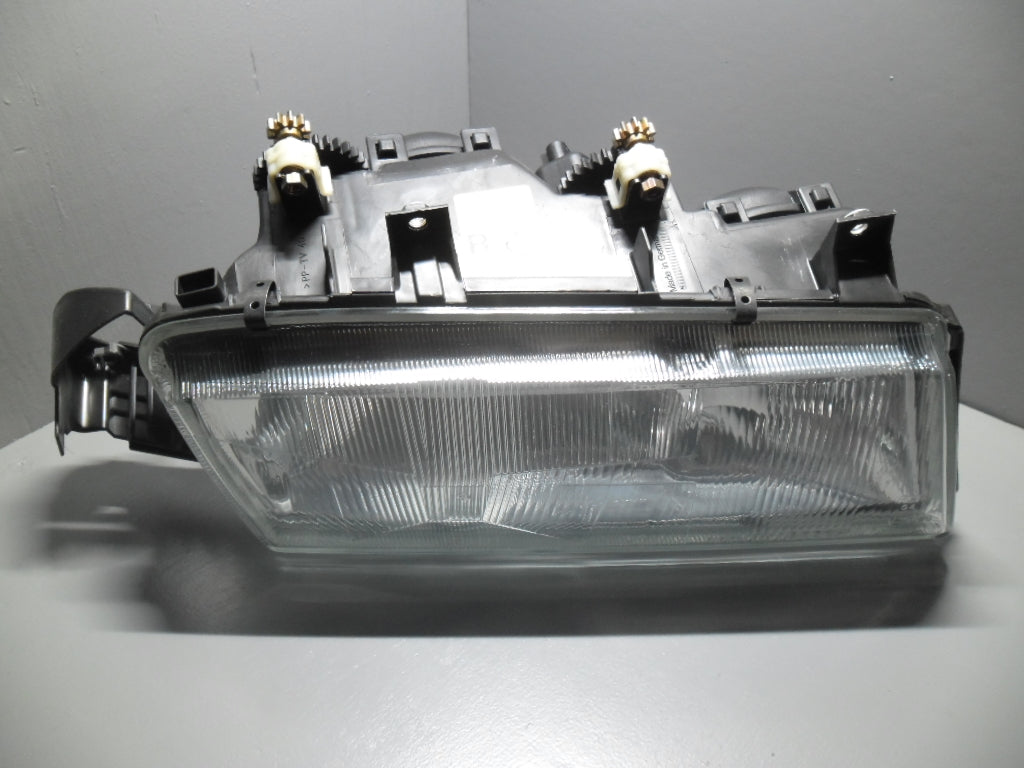 82475332  Lancia Delta koplamp rechts elektrisch verstelbaar