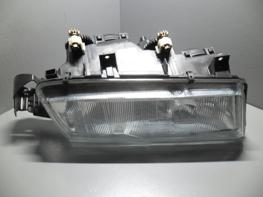 82475332  Lancia Delta koplamp rechts elektrisch verstelbaar